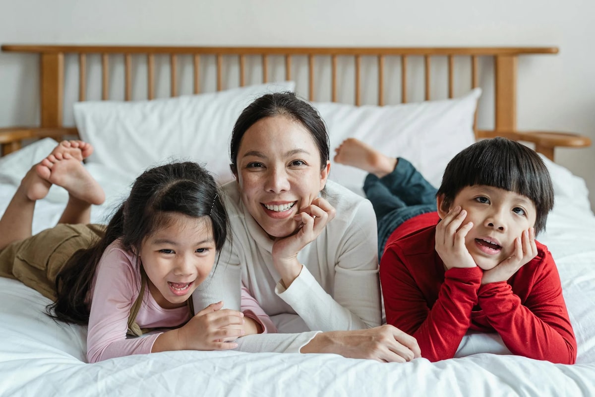 happy family in bed